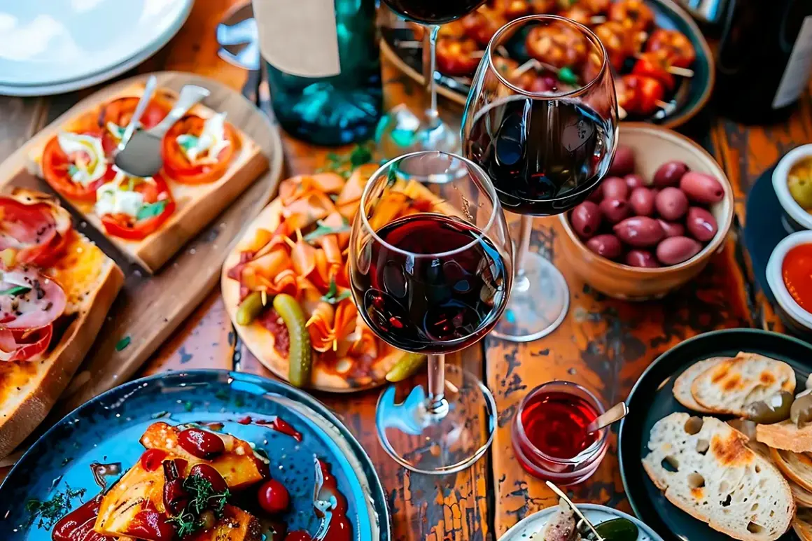 En härlig buffé med tapas och rödvin. Perfekt för en mysig kväll med goda vänner, inspirerad av ett klassiskt tapas recept.